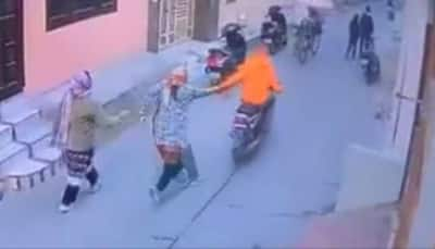 On Cam: Woman Fights Off Masked Robber Who Dragged Her Along Bike In Punjab