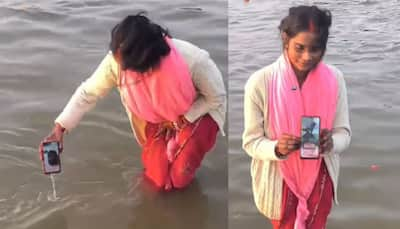 Virtual Moksha? Woman Dunks Phone In Ganga For Husband’s Maha Kumbh Dip—Internet Can’t Stop Laughing, Say ‘Gopi Bahu 2025’