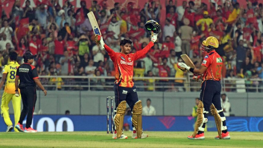 Priyansh Arya of Punjab Kings raises his bat after scoring a hundred against Chennai Super Kings at Mullanpur. (Express Photo by Kamleshwar Singh)