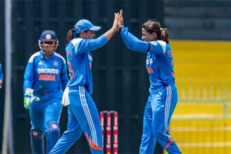 Sneh Rana (R) celebrates with Harmanpreet Kaur. Credit: BCCI Women