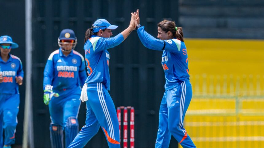 Sneh Rana (R) celebrates with Harmanpreet Kaur. Credit: BCCI Women
