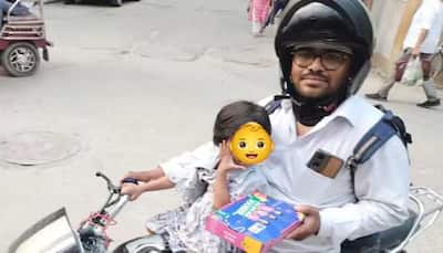 Swiggy Delivery Partner Carries 2-Year Old Daughter To Deliver Food; Netizens Are All Hearts