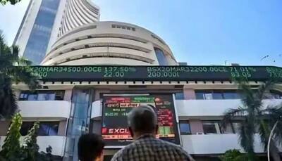 Sensex, Nifty Close Higher Amid Volatile Trading