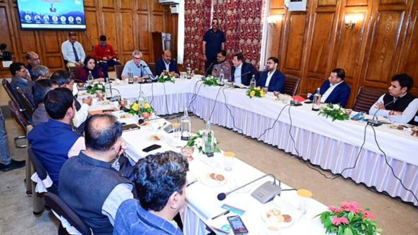 Jammu and Kashmir Chief Minister Omar Abdullah holds a meeting of Administrative Secretaries/HoDs and reviews readiness for Eid-ul-Azha, Mela Kheer Bhawani, Amarnath Yatra and Muharram, in Gulmarg on Wednesday. Gulmarg MLA Peerzada Farooq Ahmed Shah and others also present. (ANI Photo)