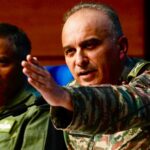 Director General of Military Operations Lt. Gen. Rajiv Ghai, right, speaks at the DGMO media briefing as Air Marshal AK Bharti looks on in New Delhi on Sunday. (AP Photo)