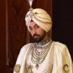 Diljit Dosanjh made his Met Gala debut in a Prabal Gurung creation inspired by Sikh royalty, featuring the Mool Mantra
