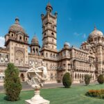 Explore the Laxmi Vilas Palace, India’s grandest royal residence—four times the size of Buckingham Palace. Discover its history, architecture, royal traditions, and Garba celebrations.