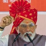 Prime Minister Narendra Modi addresses during the inauguration and foundation stone laying of various development projects, in Bikaner district, Rajasthan.