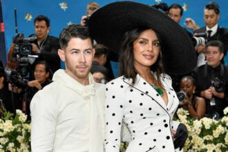 Nick Jonas, left, and Priyanka Chopra attend The Metropolitan Museum of Art's Costume Institute benefit gala celebrating the opening of the "Superfine: Tailoring Black Style" exhibition on Monday, May 5, 2025, in New York. (Photo by Evan Agostini/Invision/AP)