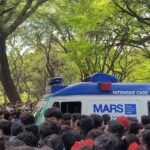 Ambulance carries unconscious patient at M. Chinnaswamy Stadium, Bengaluru - RCB Victory Parade event