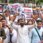 Agartala: BJP supporters and leaders during a protest rally condemning the recent vandalism at Nobel Laureate Rabindranath Tagore's ancestral home in Bangladesh. (PTI Photo)
