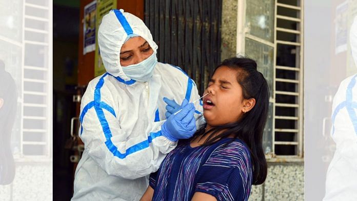 A child gets tested for COVID-19 | ANI