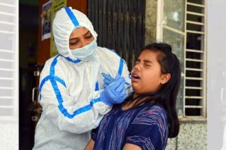 A child gets tested for COVID-19 | ANI