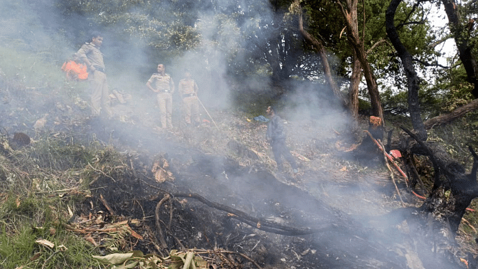 Security personnel at the spot after a helicopter crashed near the Kedarnath shrine, in Rudraprayag district, Uttarakhand on 15 June 2025. | PTI