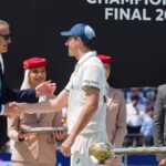 Australia's captain Pat Cummins is greeted by an official during the presentation ceremony after their loss in the World Test Championship final against South Africa at Lord's cricket ground in London, Saturday, June 14, 2025. (AP Photo)