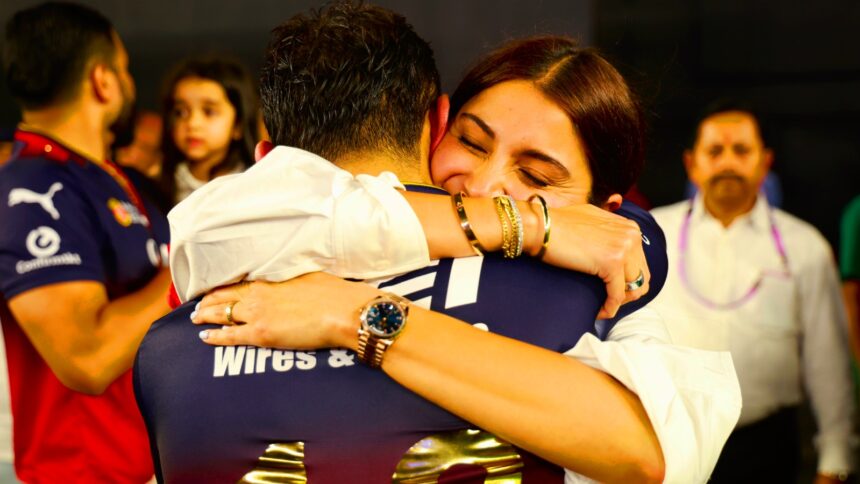 Virat Kohli of Royal Challengers Bengaluru celebrating RCB's win with wife Anushka Sharma at the Narendra Modi Stadium, Ahmedabad. (Sportzpics for IPL)