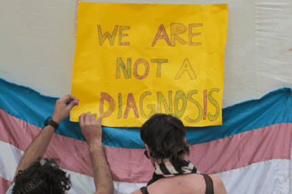 Trans activists putting up a poster at Jantar Mantar, New Delhi | Photo: Suraj Singh Bisht, ThePrint