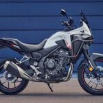 The 2024 Honda NX500 uses a 471 cc parallel-twin engine that develops 47 bhp peak power.