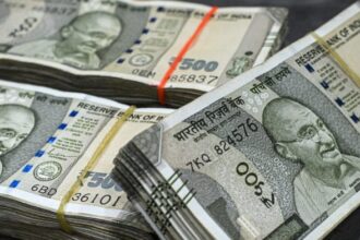 Bundles of 500 rupee banknotes. | Bloomberg