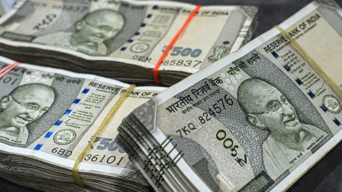 Bundles of 500 rupee banknotes. | Bloomberg