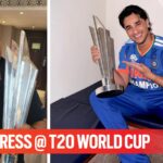 Abhishek Sharma and his father Raj Kumar Sharma (R) with T20 World Cup trophy. (CREDIT: Special Arrangement/Instagram)