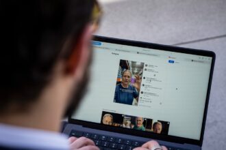 Josemaria Silvestrini, the owner of Modern Antidote, with a video of the Melanskia artificial intelligence avatar, in Beijing