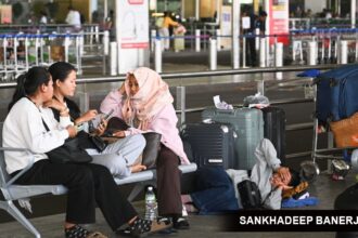 A group of passengers is stranded at Chhatrapati Shivaji Maharaj International Airport terminal 2 as their flights to different places in the middle east are cancelled due to the ongoing Iran-Israel conflict, in Mumbai on 01 March 2026. Express photo by Sankhadeep Banerjee