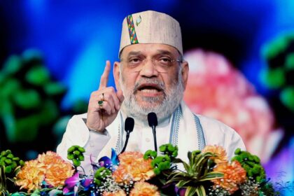 Haridwar, Mar 07 (ANI): Union Home Minister Amit Shah addresses during the programme 'Jan-Jan Ki Sarkar, 4 Saal Bemisaal' organised on the occasion of the completion of four years of the state government, in Haridwar on Saturday. (ANI Photo)