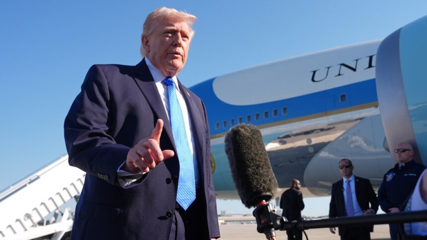 President Donald Trump speaks with the media before boarding Air Force One, Monday, March 23, 2026, at Palm Beach International Airport in West Palm Beach, Fla. (AP Photo/Mark Schiefelbein)