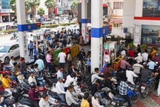 Vehicles queue at a fuel pump in Prayagraj Thursday | Photo: ANI