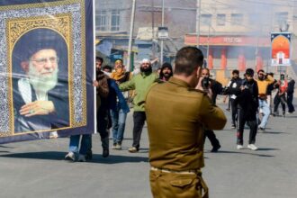 Several people, including police personnel, were injured in clashes as police fired teargas shells to disperse protesters in north Kashmir.