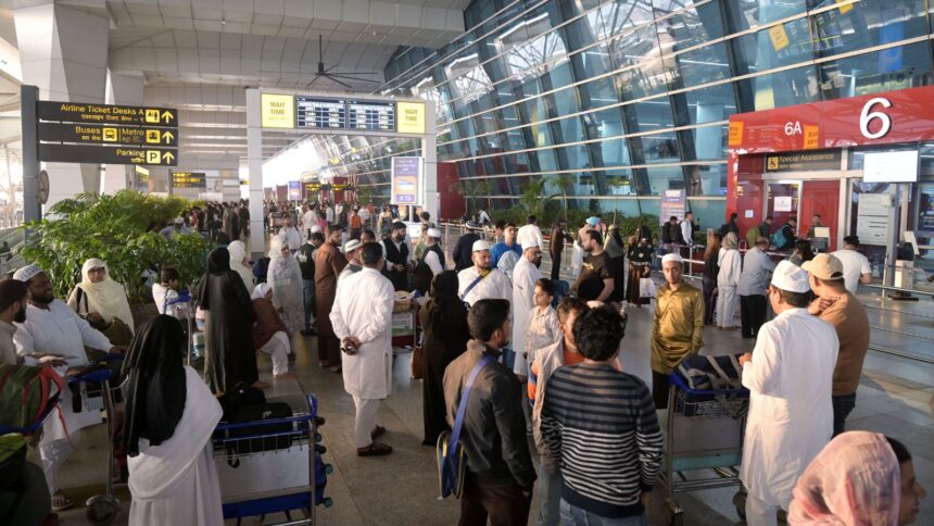 New Delhi, Mar 02 (ANI): Passengers stranded due to flight disruptions and cancellations following the situation in the Middle East, at Terminal 3 of Indira Gandhi International Airport, in New Delhi on Monday. (ANI Photo)