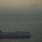 Cargo ships sail in the Arabian Gulf towards Strait of Hormuz in United Arab Emirates, Thursday, March 19, 2026. (AP Photo)