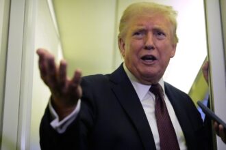 US President Donald Trump speaks to reporters aboard Air Force One, Sunday, March 15, 2026, en route from West Palm Beach, Fla. to Joint Base Andrews