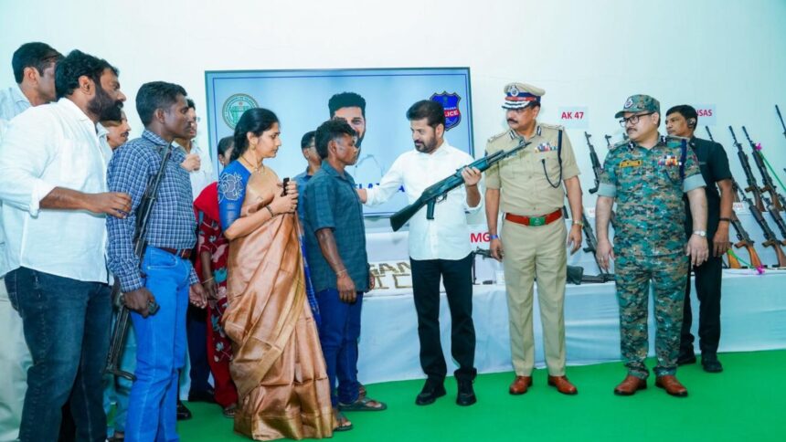 Revanth Reddy attended an event where 130 Maoists surrendered on Saturday, along with 124 weapons and live ammunition. (Express Photo)