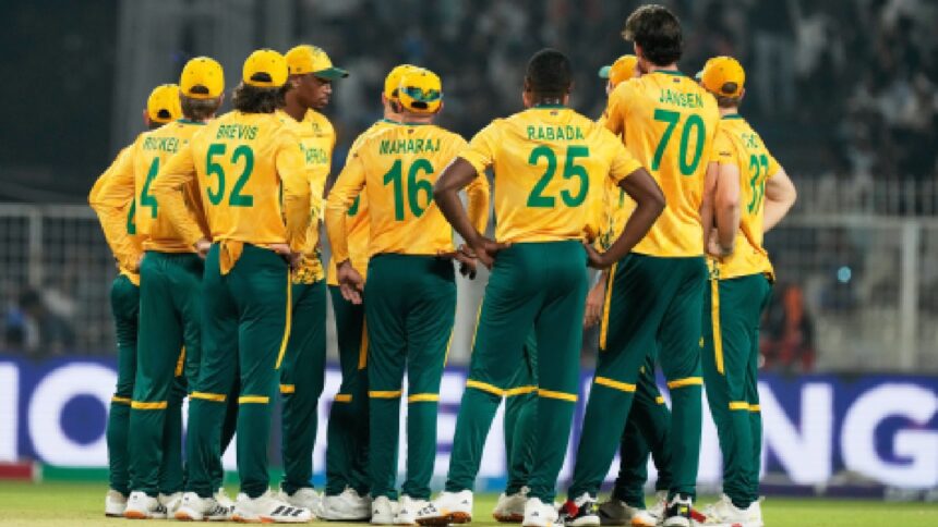 South Africa's players wait for the third umpire's decision for the wicket of New Zealand's Tim Seifert during the first T20 World Cup cricket semifinal match between New Zealand and South Africa in Kolkata, India, Wednesday, March 4, 2026. (AP Photo)