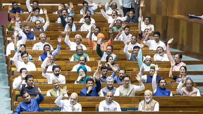 PM Narendra Modi, Union Ministers Amit Shah, Rajnath Singh, Nitin Gadkari, S Jaishankar, Piyush Goyal, Ashwini Vaishnaw, Kiren Rijiju, and others in Lok Sabha during the ongoing Budget Session of Parliament, in New Delhi on Wednesday. | Sansad TV/ANI Video Grab