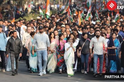 West Bengal Chief Minister and TMC chief Mamata Banerjee leads a protest march accompanied by party leaders and others against the Enforcement Directorate's searches linked to political consultancy firm I-PAC, in Kolkata, Jan. 9, 2026. (PTI Photo)