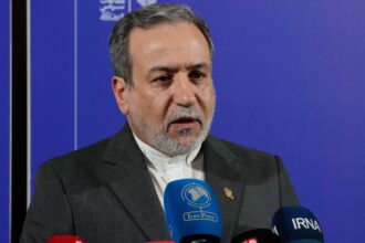 Iranian Foreign Minister Abbas Araghchi speaks in a new briefing after attending a conference titled "International Law Under Assault: Aggression and Self-Defense," in Tehran. (AP Photo)