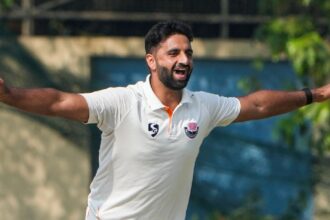 Jammu and Kashmir's Auqib Nabi celebrates during the third day of the Ranji Trophy semifinal match between Bengal and Jammu and Kashmir at the Bengal Cricket Academy Ground, in Kalyani, West Bengal. (PTI Photo)