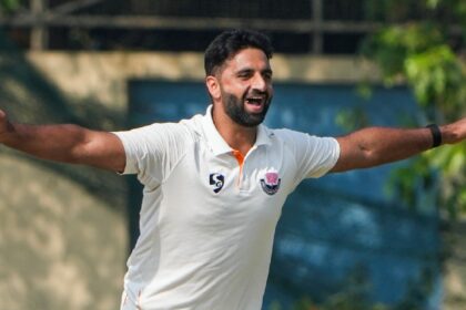 Jammu and Kashmir's Auqib Nabi celebrates during the third day of the Ranji Trophy semifinal match between Bengal and Jammu and Kashmir at the Bengal Cricket Academy Ground, in Kalyani, West Bengal. (PTI Photo)