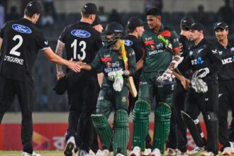 New Zealand's players shake hands with Bangladesh's players after winning the first one day international cricket match between Bangladesh and New Zealand in Mirpur, Bangladesh, Friday, April 17, 2026. (AP Photo)