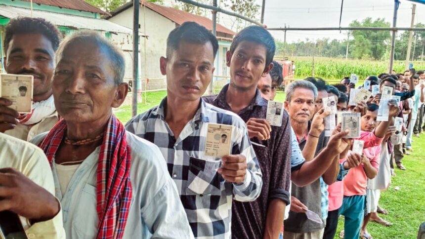 Alipurduar [West Bengal], Apr 23 (ANI): Electors queue infront of polling stations during the first phase of the West Bengal Assembly Elections 2026, in Alipurduar on Thursday. @CEOWestBengal X/ANI Photo)