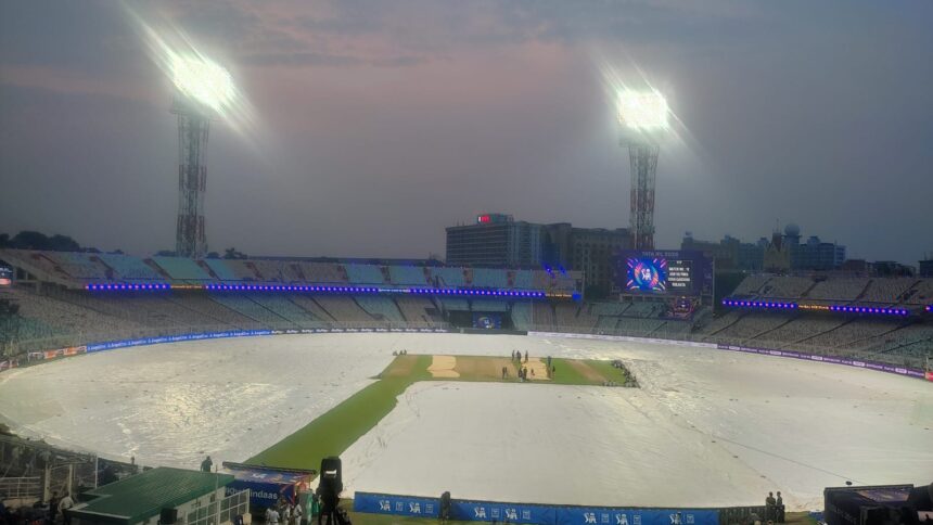 IPL 2026: The Eden Gardens ground under covers a few hours out from the KKR vs PBKS match on Monday. (Express Photo by Sayak Dutta)