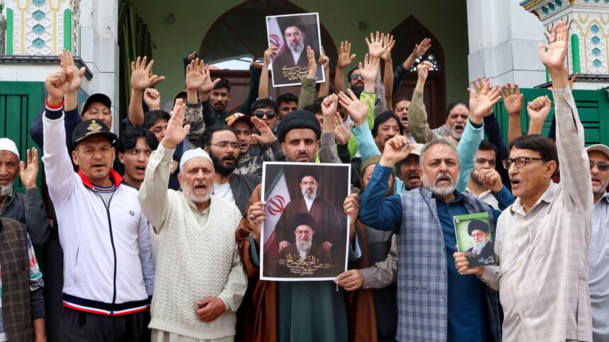 People raise slogans and hold portraits of late Iran's Supreme Leader Ayatollah Ali Khamenei, in view of the two-week ceasefire agreement between Iran, the United States and Israel, in Jammu, Wednesday, April 8, 2026. (PTI Photo)