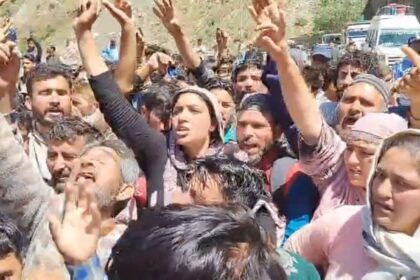 People blocking Jammu-Srinagar national highway in protest against cow vigilantes who assaulted a local youth carrying a bovine animal home in a vehicle. (Express Photo) man missing