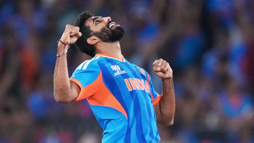 India's Jasprit Bumrah celebrates the wicket of New Zealand's Matt Henry during the T20 World Cup cricket final match between India and New Zealand in Ahmedabad, India, Sunday, March 8, 2026. (AP Photo)