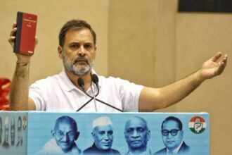 Congress Leader and Leader of Opposition Rahul Gandhi showing The Constitution of India during address his party leaders and supporters at Vigyan Bhawan | Praveen Jain | ThePrint