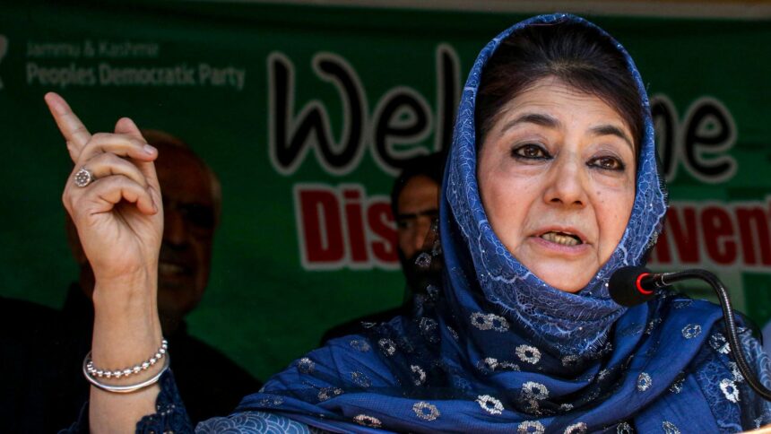 Pulwama: Peoples Democratic Party (PDP) President Mehbooba Mufti addresses the gathering during the party convention at Chandgam village in Pulwama district, Jammu and Kashmir. (PTI Photo)