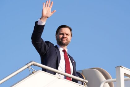 Vice President JD Vance waves as he boards Air Force Two after attending talks on Iran in Islamabad, Pakistan. (AP Photo)